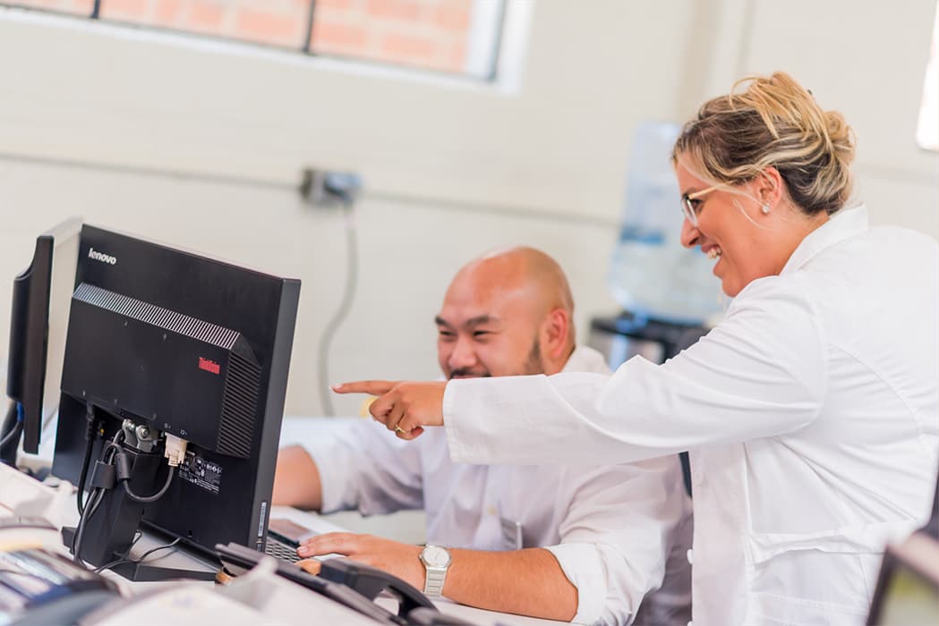Our Story Image - Jess and Thomas working together